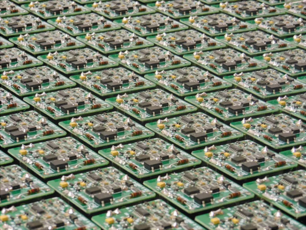 Rows of ICM Controls digital start relay circuit boards with electronic components, used inside rotary phase converters for reliable idler motor starting.